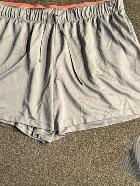 Nike Women's Light Gray Athletic Shorts with Coral Waistband